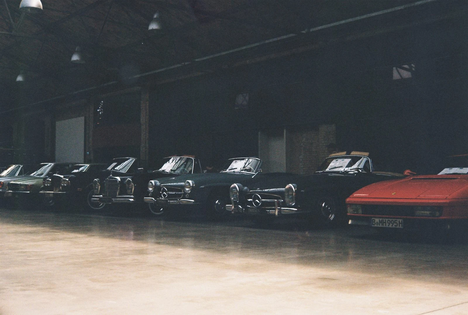 Mercedes 300SL, W113 Pagoda, and Ferrari Jalpa lined up — Thiesen Berlin