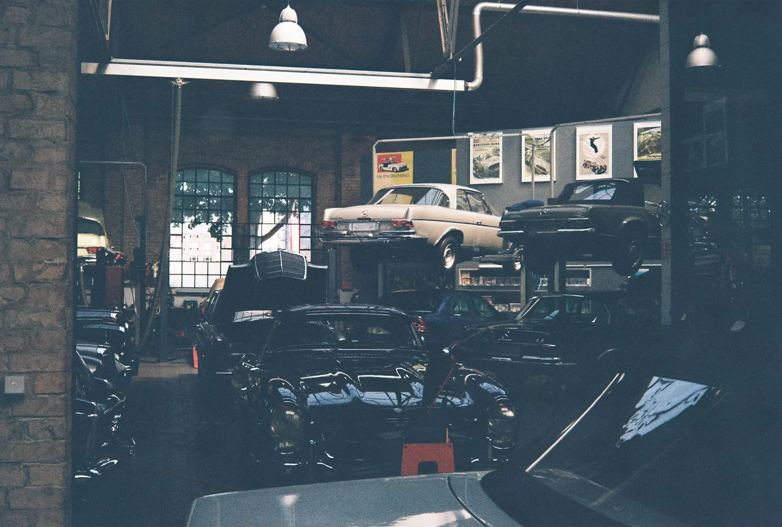 Classics packed tight behind a brick column