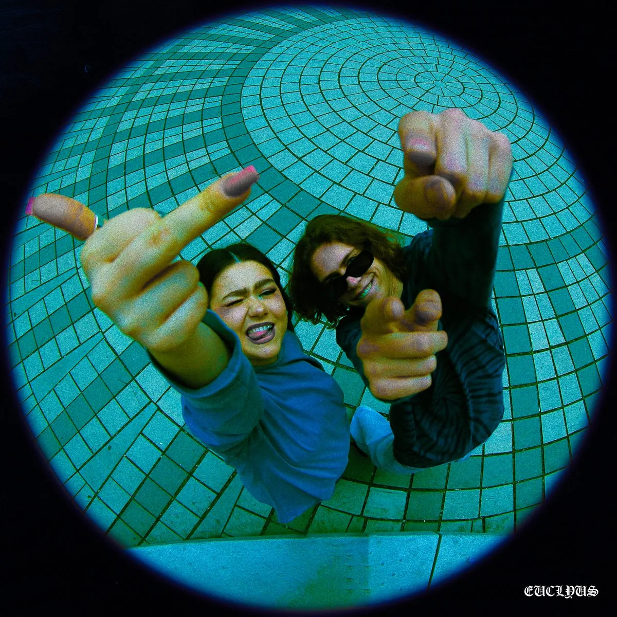 Two artists shot from below through the fisheye