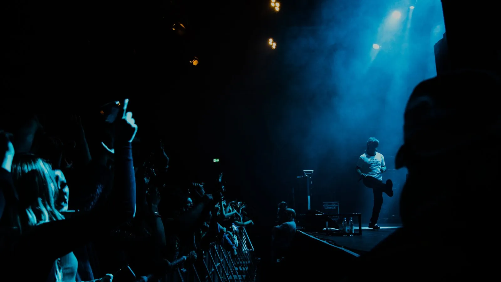 Performer alone in blue haze