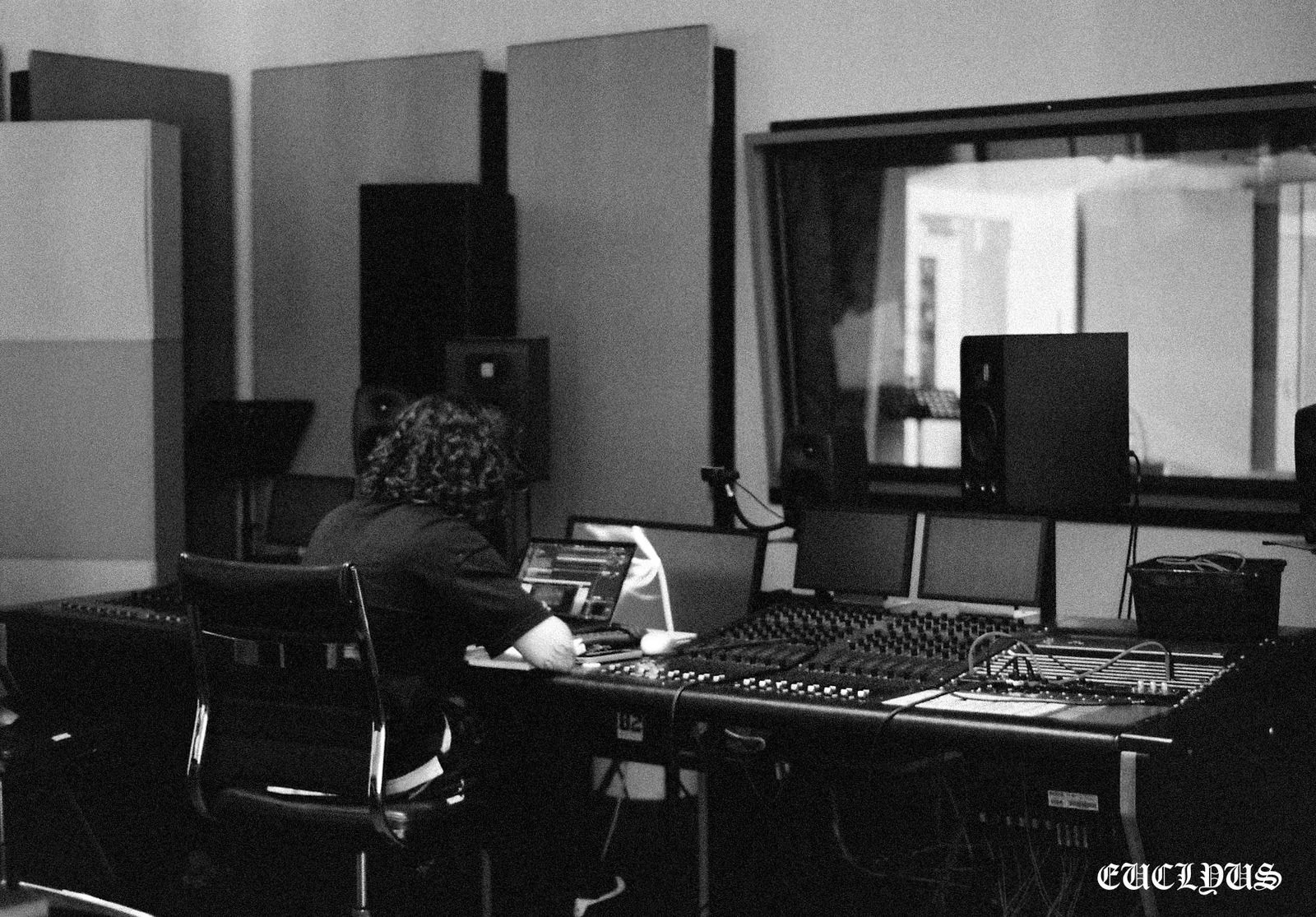 Artist at the mixing desk during a recording session