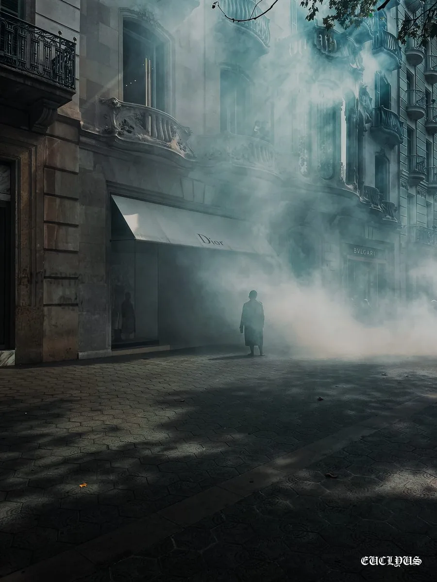 Figure in smoke, Passeig de Gràcia, Barcelona
