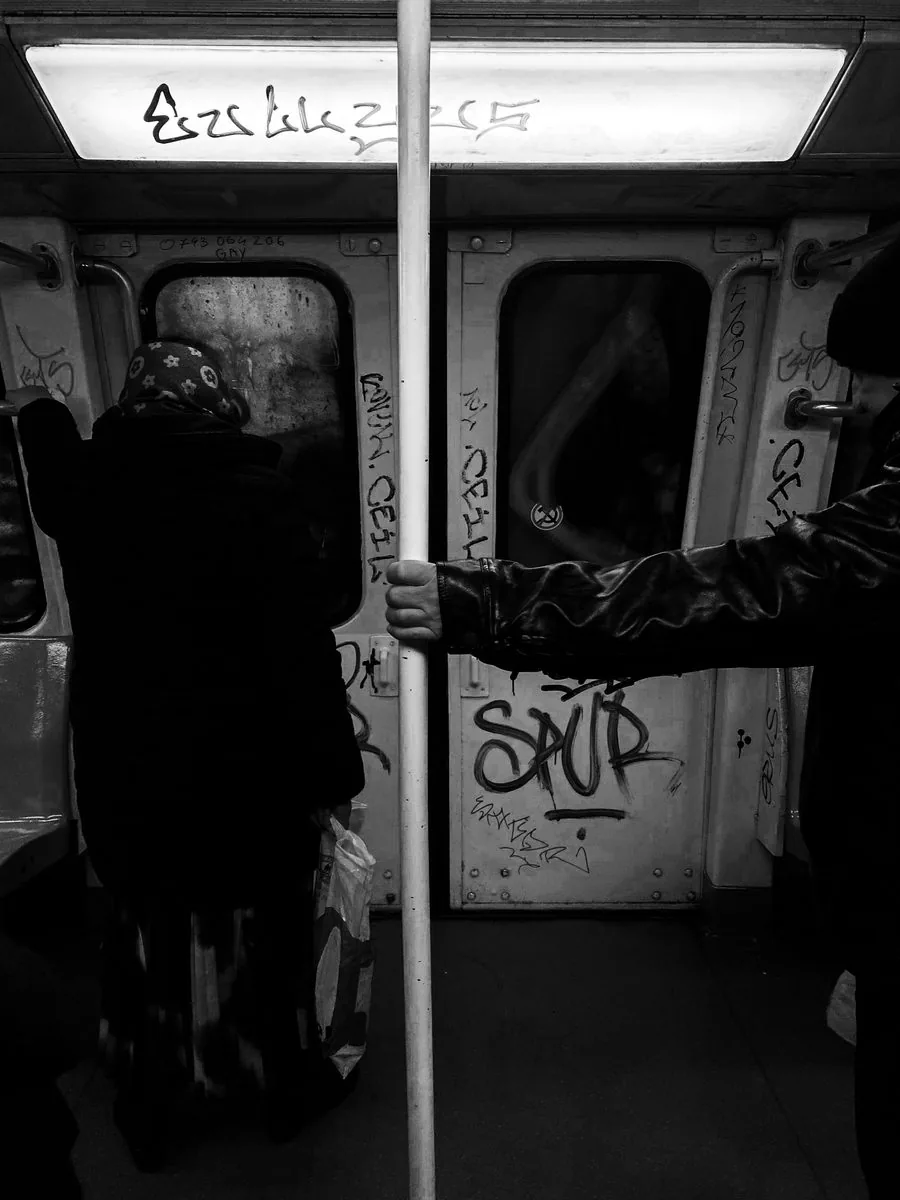 Tagged Bucharest metro car, commuters inside